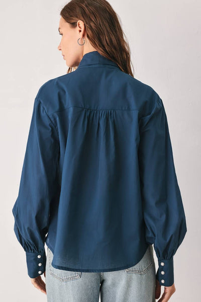 Blusa manga larga con moño