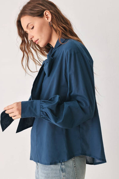 Blusa manga larga con moño