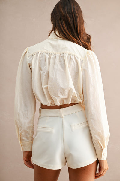 Blusa corta cinta cuello