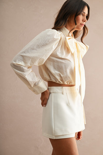 Blusa corta cinta cuello