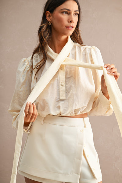 Blusa corta cinta cuello