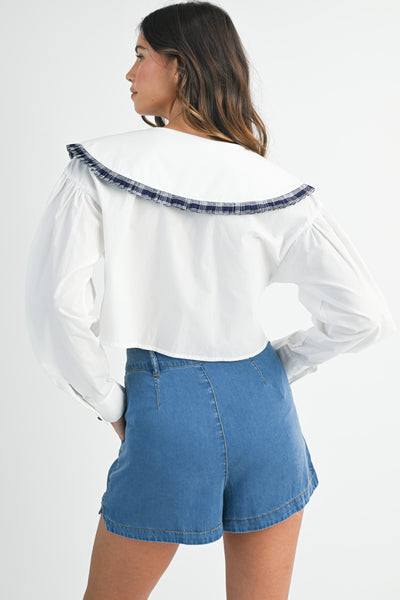 Blusa manga larga cuello y lazos