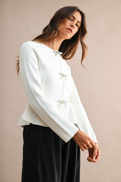 Blusa  peplum manga larga con moños