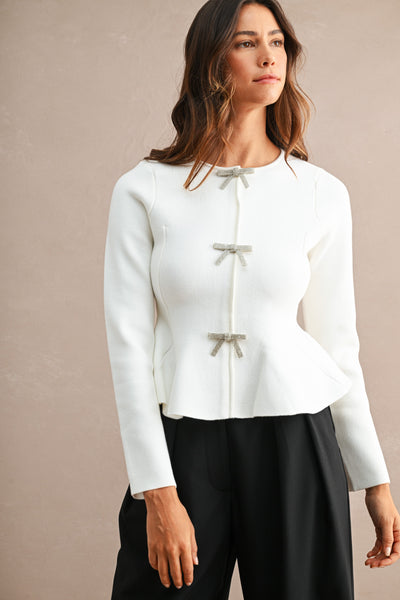 Blusa  peplum manga larga con moños