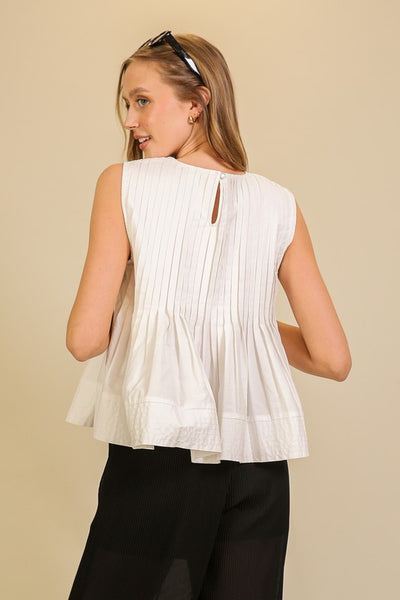 Blusa pliegues sin manga