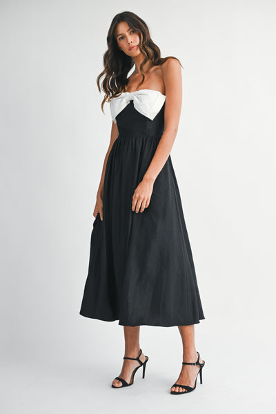 Vestido largo strapless con moño