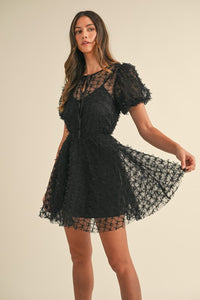 Vestido  mini transparencia manga abullonada