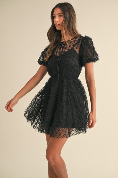 Vestido  mini transparencia manga abullonada