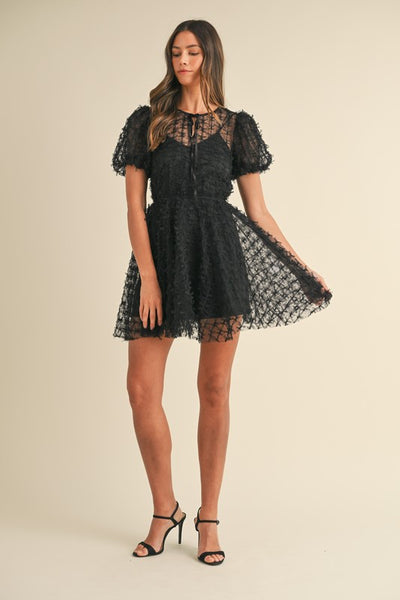 Vestido  mini transparencia manga abullonada